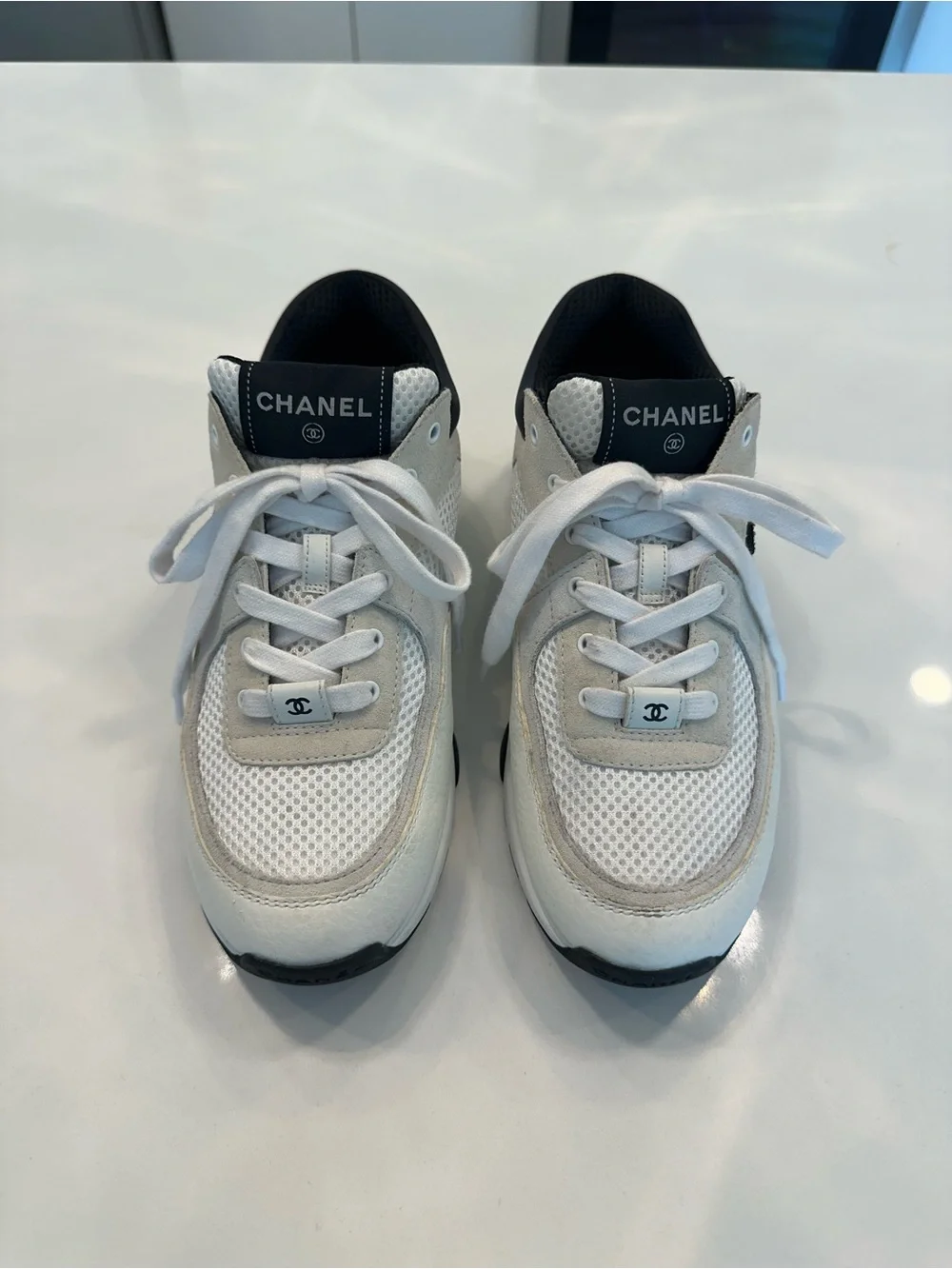 CHANEL White and Black Sneakers